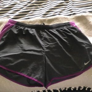 Gray and purple Nike shorts